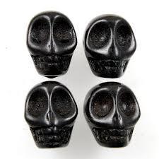 BLACK STONE SKULL BEADS  7.5 X 9.5MM 16'' STRAND